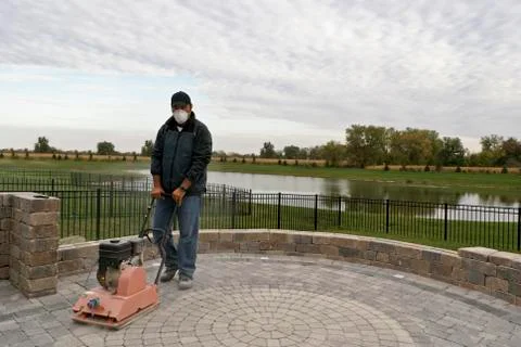 Compacting worker Stock Photos