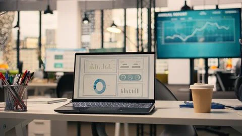Company data shown on screen in empty executive office space Stock Photos