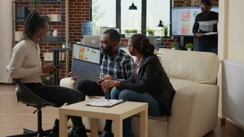Company employees doing teamwork to create data charts Stock Footage 179553946