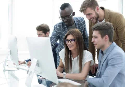 Company employees working in software development and designer office Stock Photos