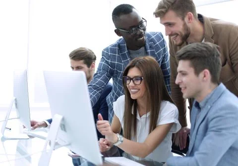 Company employees working in software development and designer office Stock Photos