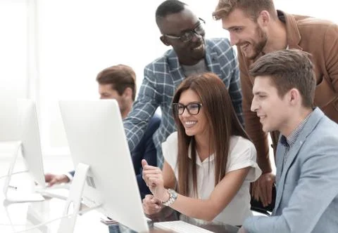 Company employees working in software development and designer office Stock Photos