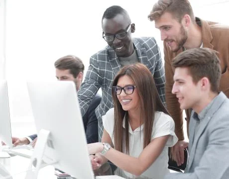Company employees working in software development and designer office Stock Photos