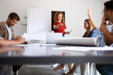 Company employees working in software development and designer office Stock Photos