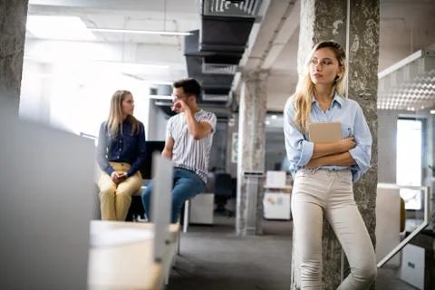 Company employees working in software development and designer office Stock Photos