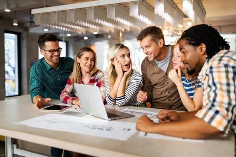 Company employees working in software development and designer office Stock Photos
