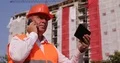 Company Manager Inspect Construction Site Talking Phone and Looking Tablet Plans 4k or 4k+ Resolution