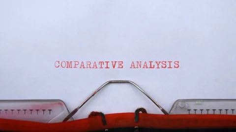 Comparative analysis - phrase printed on an old typewriter in red letters Stock Footage 129535760