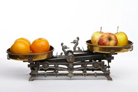 Compare apples to oranges Stock Photos