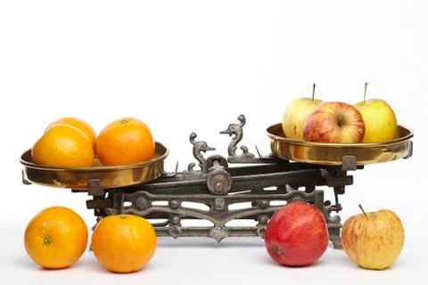 Compare apples to oranges Stock Photos