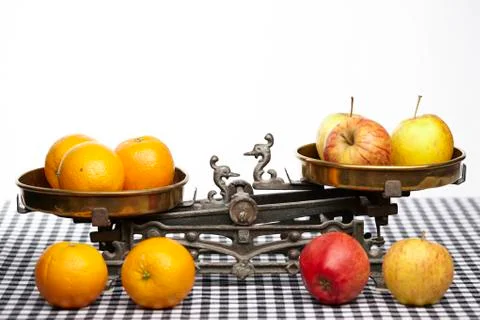 Compare apples to oranges Stock Photos