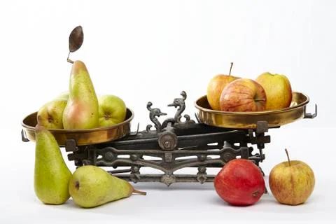 Compare apples to pears Stock Photos