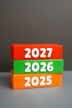 Comparing 2025 with 2026 and forecasting 2027. Concept of business analytic.. Stock Photos