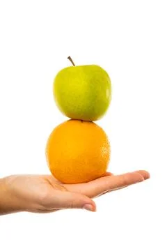 Comparison of apples with oranges. Stock Photos