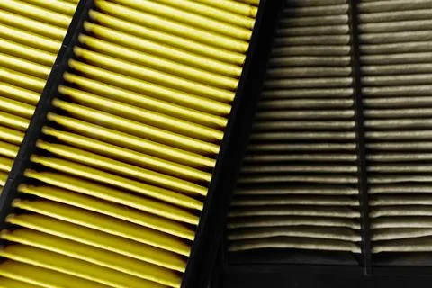 Comparison between new air filter and used air filter Stock Photos