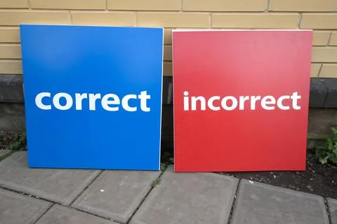 Comparison of Correct and Incorrect Words on Colorful Educational Boards Stock Photos