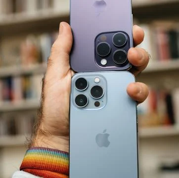 Comparison of iPhone 15 Pro and iPhone 14 Pro Models Stock Photos