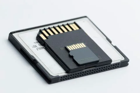 Comparison picture of compact flash sd card and micro sd memory cards on white Foto stock