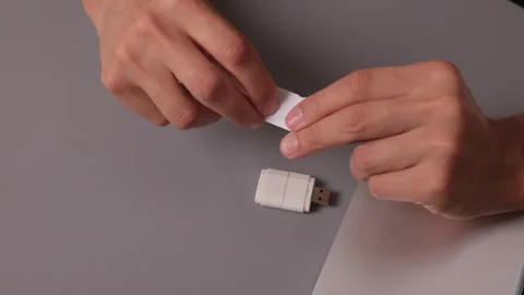 Comparison of SD and MicroSD Cards in Different Hands and Their Various Uses and Stock Footage 313630429