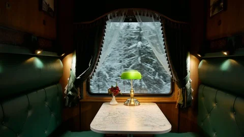 Compartment in a retro train, view of the snow forest Windows Stock Footage 125697842