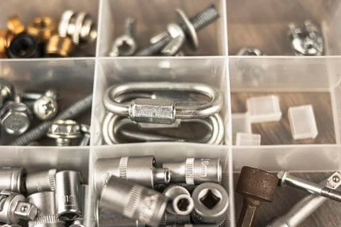 Compartmentalized box with different DIY elements Stock Photos