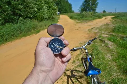 With compass and Bicycle front fork. Stock Photos