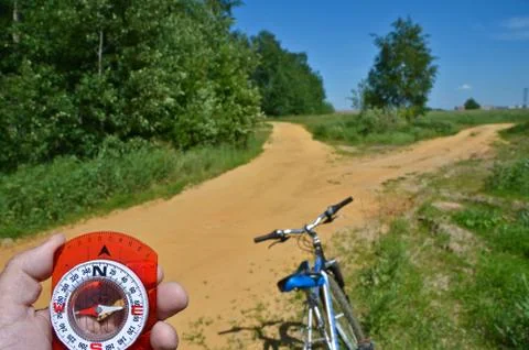 With compass and Bicycle front fork. Stock Photos