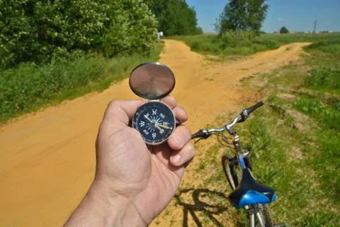 With compass and Bicycle front fork. Stock Photos