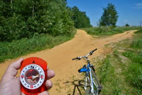 With compass and Bicycle front fork. Stock Photos