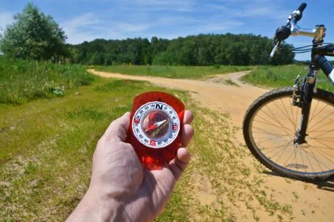 With compass and Bicycle front fork. Stock Photos