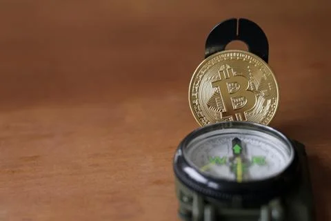Compass and Bitcoin - finding the way Foto stock