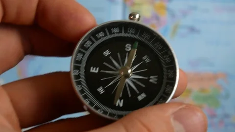 Compass and map in male hands Stock Footage 120612924
