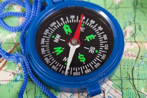 Compass and map Stock Photos