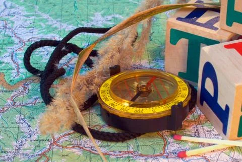 Compass and map Stock Photos