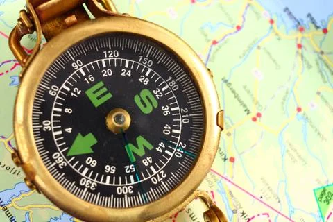 Compass and map Stock Photos