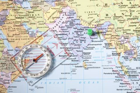 Compass and map Stock Photos