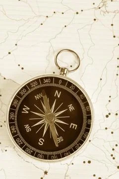 Compass and map Stock Photos