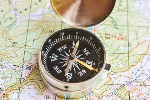 Compass and map. Stock Photos