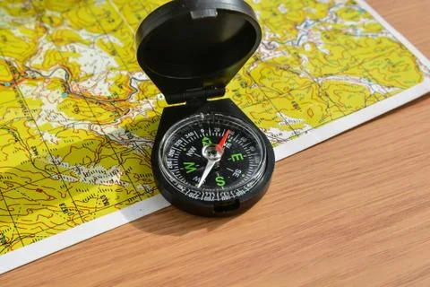 Compass and map. Stock Photos