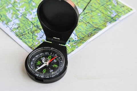 Compass and map. Stock Photos