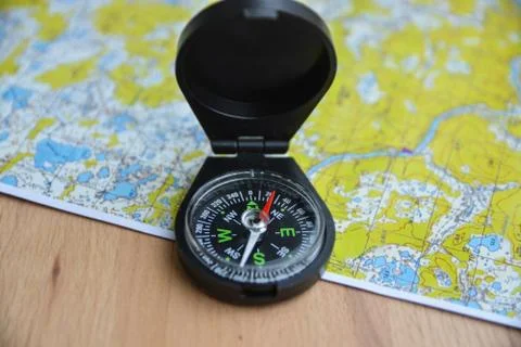 Compass and map. Stock Photos