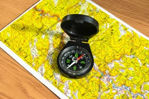 Compass and map. Foto stock