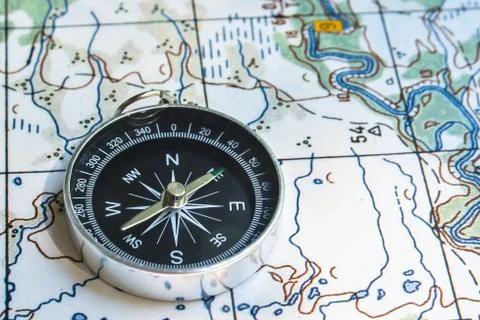 Compass and map. Stock Photos