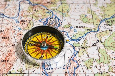 Compass and map. Stock Photos