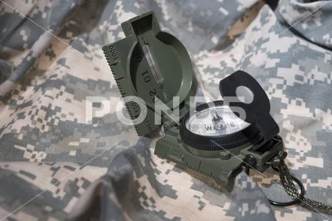 Compass and map reading survival outdoors Stock Photos