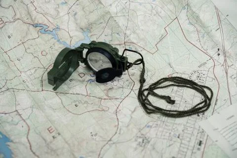 Compass and map reading survival outdoors Stock Photos