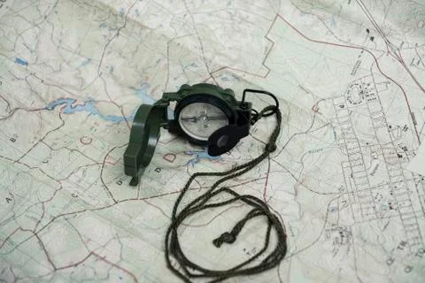 Compass and map reading survival outdoors Foto stock