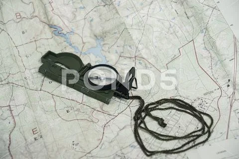 Compass and map reading survival outdoors Stock Photos