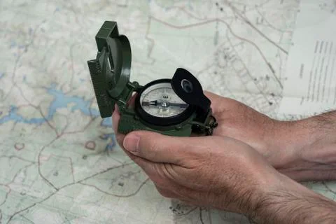 Compass and map reading survival outdoors Stock Photos