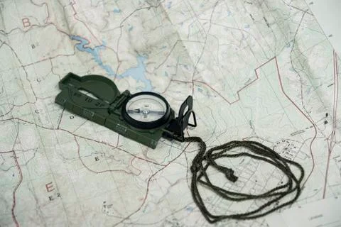 Compass and map reading survival outdoors Stock Photos